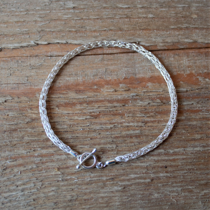 Zilveren geweven armband uit de Dragonstail collectie handgemaakt door Goudsmederij Goedbloed