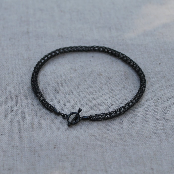 925 Zilveren Dragonstail armband. Een armband gemaakt met een oude sieraden techniek. Handgemaakt door Goudsmederij Goedbloed.